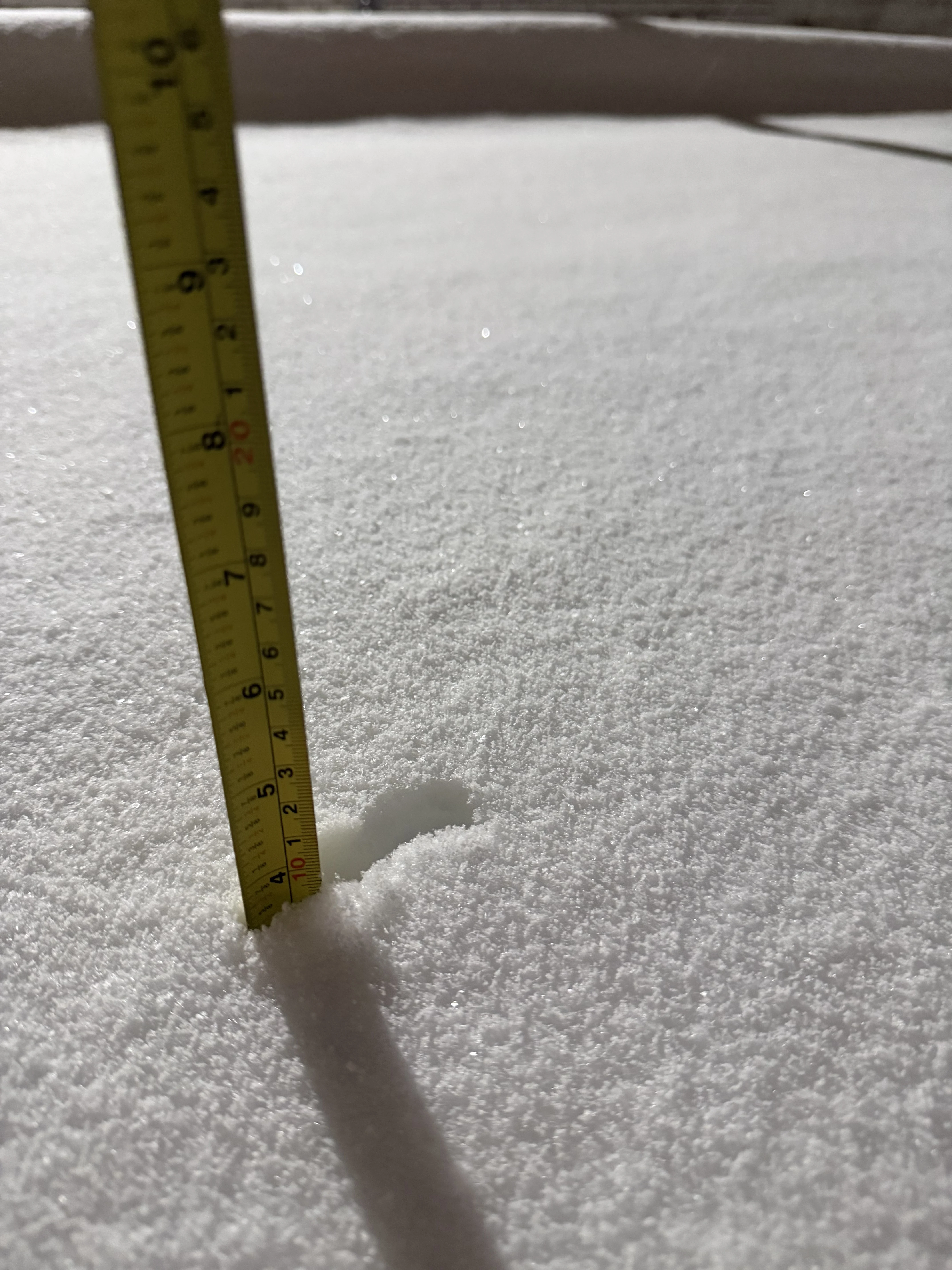 Clearline Outdoor crew measuring snowfall on-site overnight to confirm trigger depth